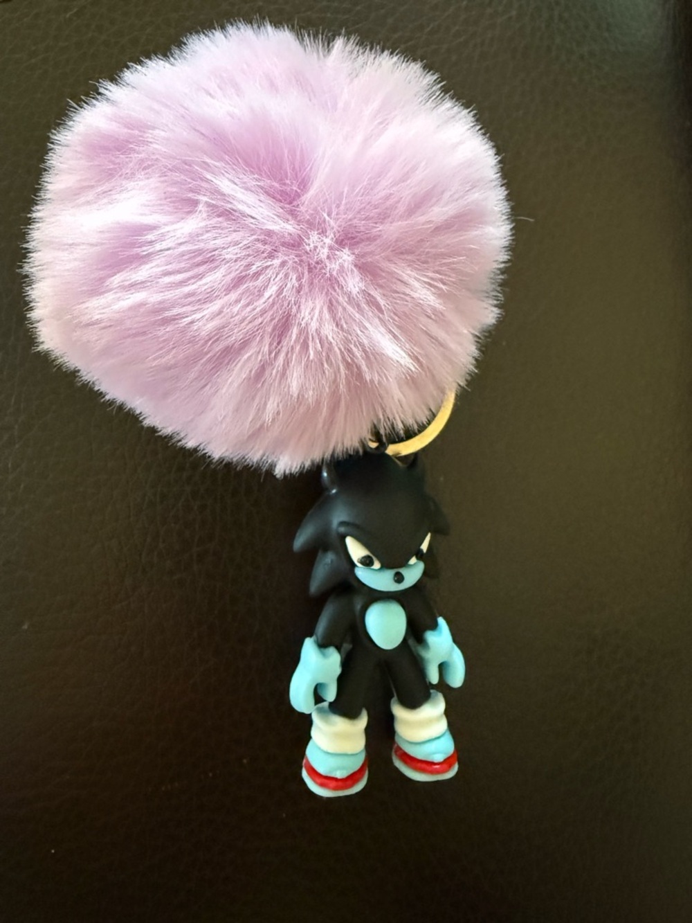 Plush Light Purple Pom-Pom Keychain with Black Character Charm